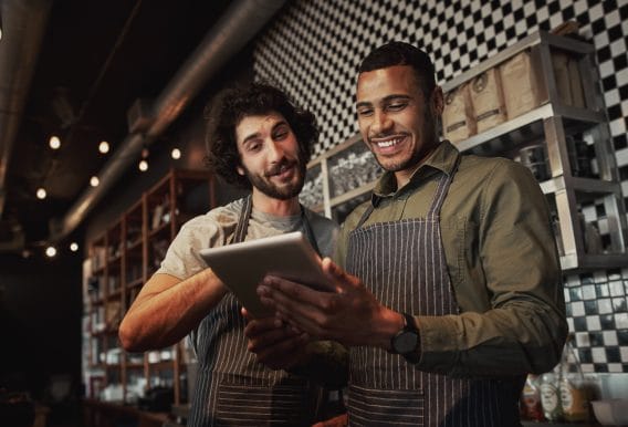 Coffee shop staff on tablet
